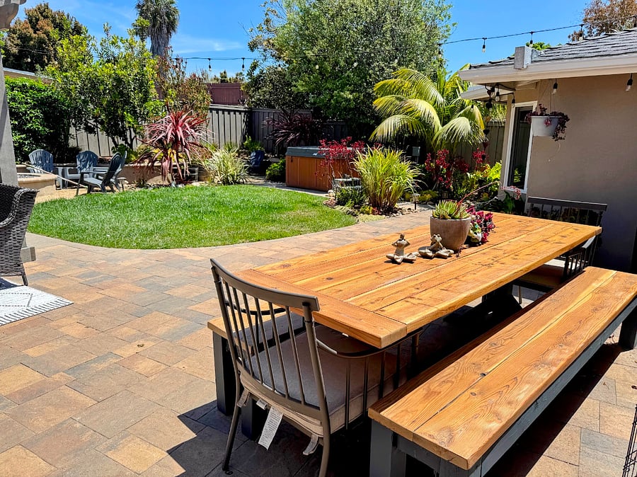 Outdoor dining for 8-10 and mature garden with hot tub.