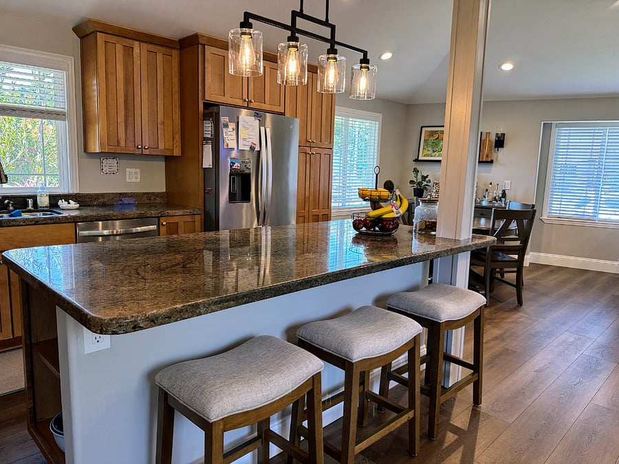 Large kitchen island with seating for three.