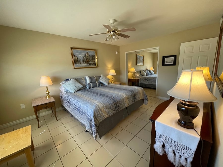 Both bedrooms offer large closets with full-length mirrored doors