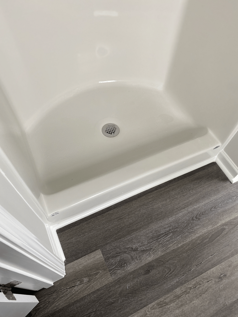 Private bath room shower -- enclosure to be installed along with towel shelves