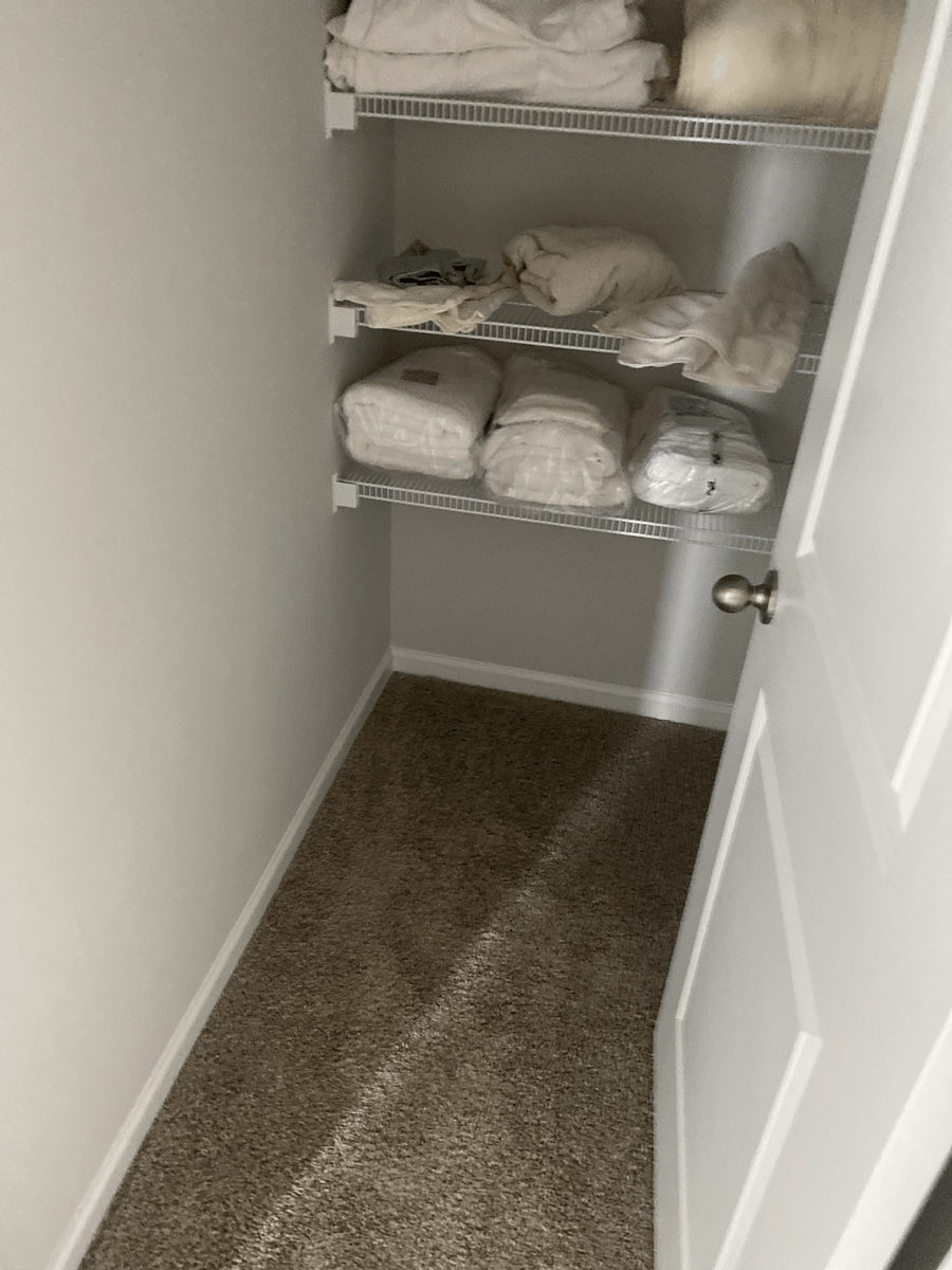 linen closet. next to laundry room