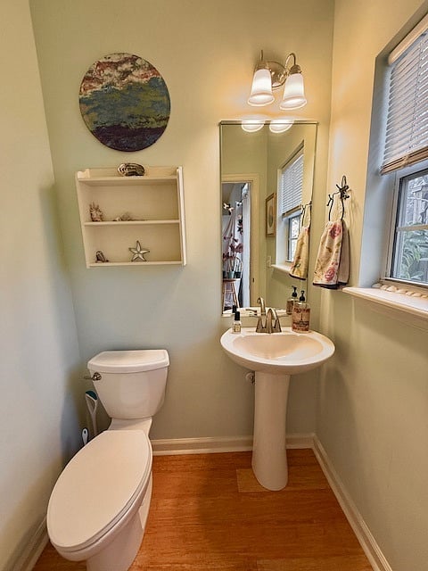 Half bath off the kitchen by sliding glass door on first floor