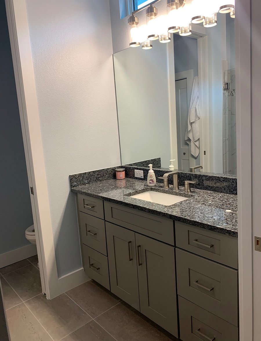 Primary bathroom, shower with separated commode space