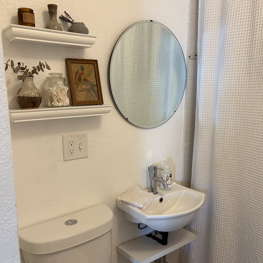 Bathroom includes full sized tub and shower