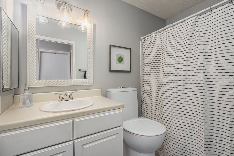 Upstairs bathroom located in hallway between king and queen bedrooms