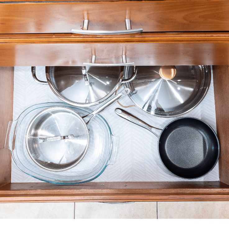 Fully stocked kitchen with quality stainless steel pots and pans
