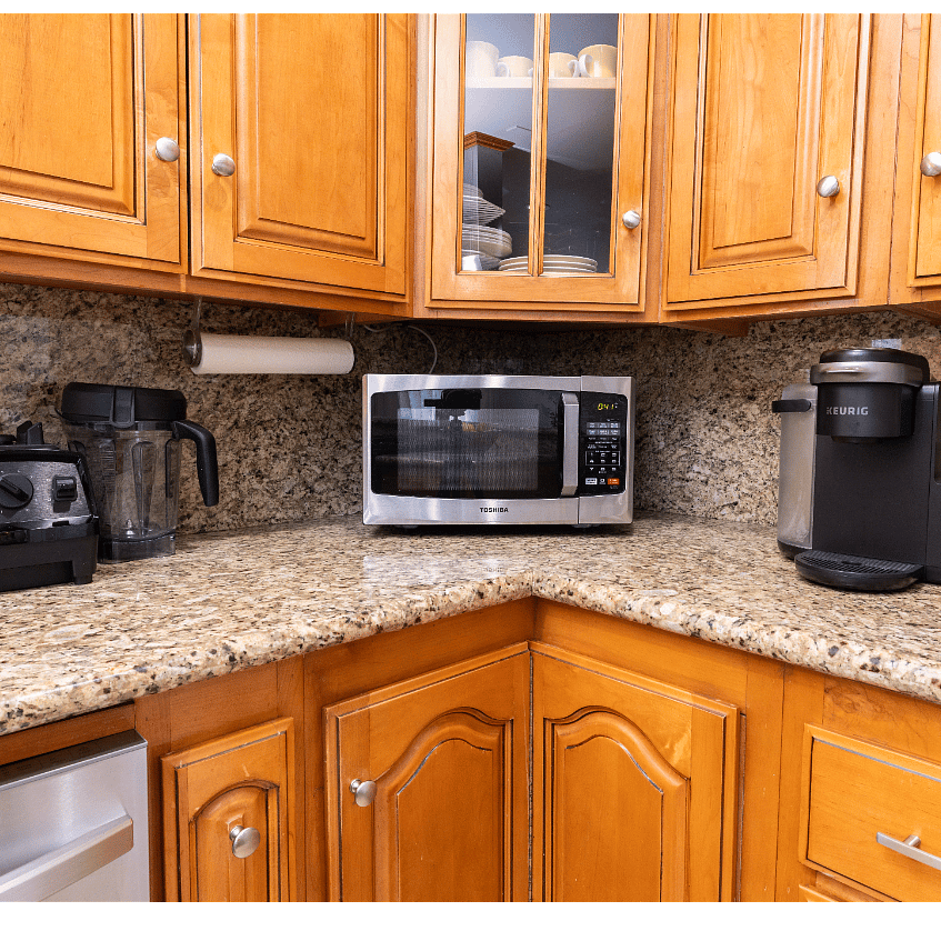 Fully equipped kitchen with: Blender, Keurig, Microwave, Toaster, Conventional Oven, Air fryer, and more appliances 