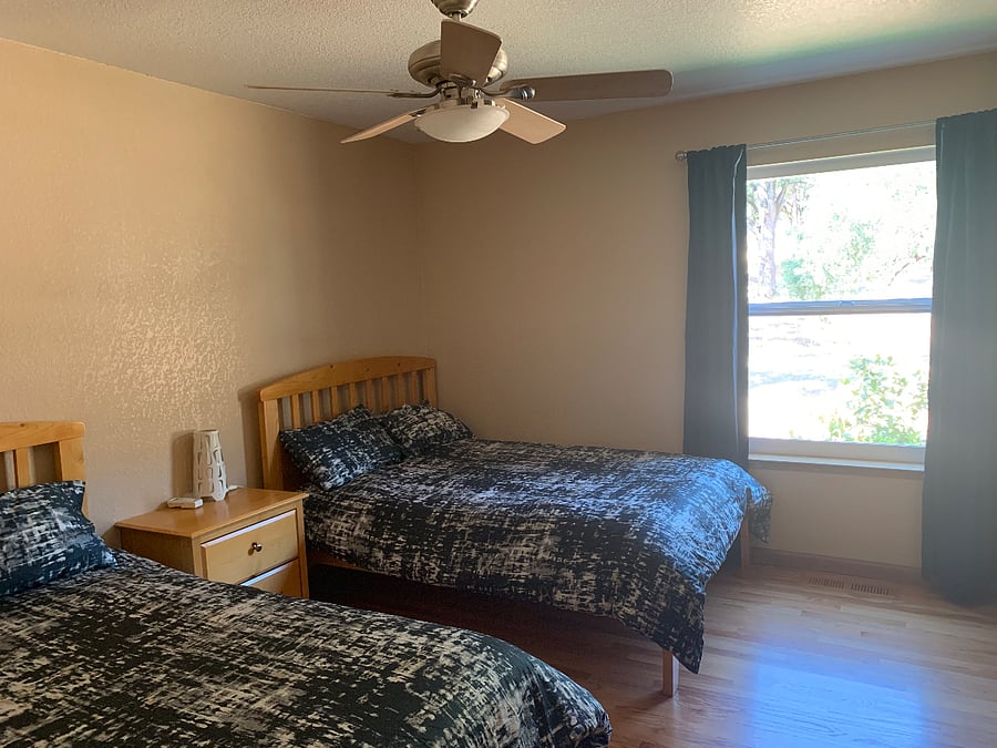 2nd downstairs bedroom with 2 full beds