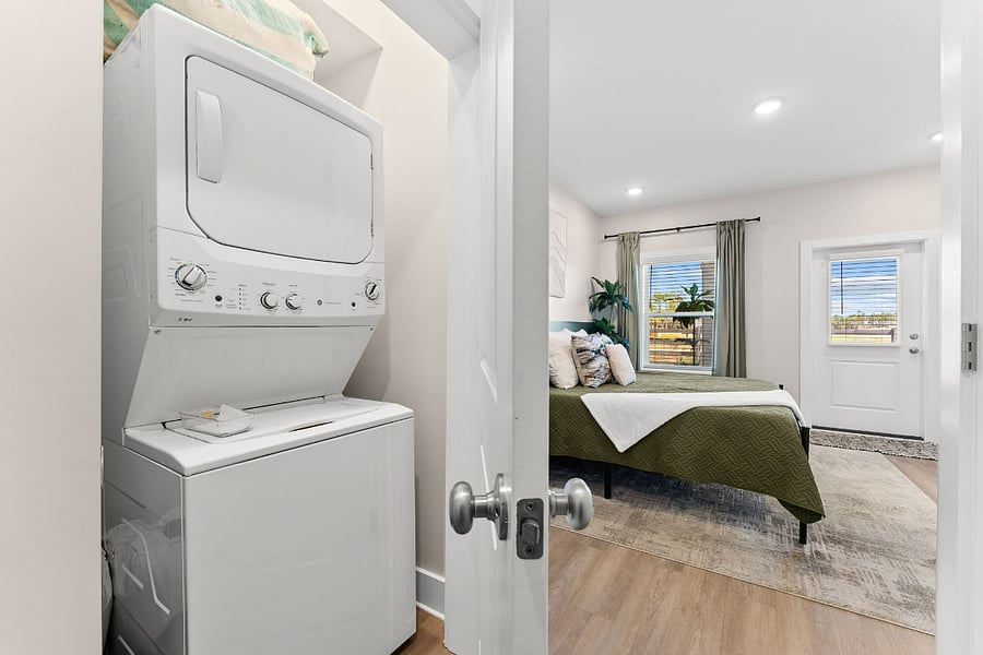 Stackable washer and dryer located on the first floor