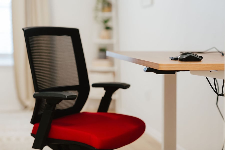 Dedicated workspace - sitting or standing desk with the click of a button
