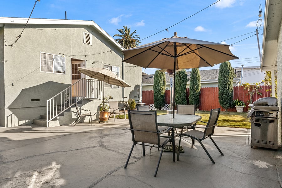 Backyard with BBQ and outdoor seating