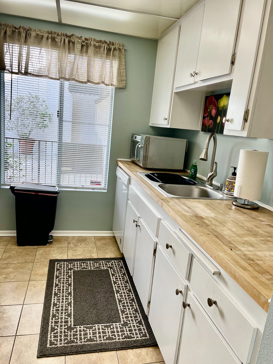 Butcher block counter tops and lots of light. 