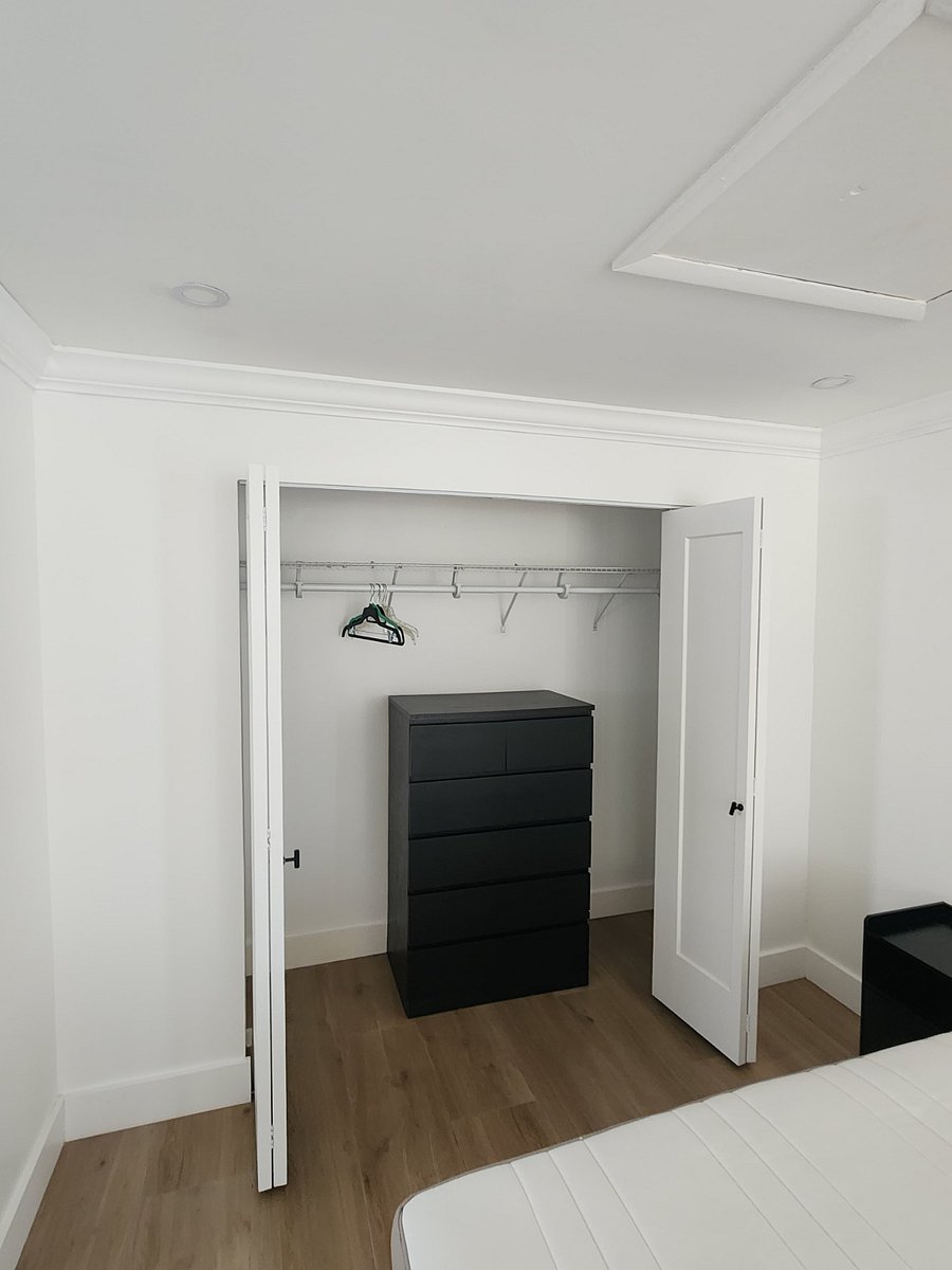 Closet space with dresser. 