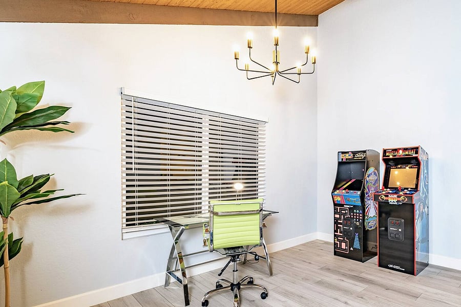 Dedicated work desk + Arcade games area.