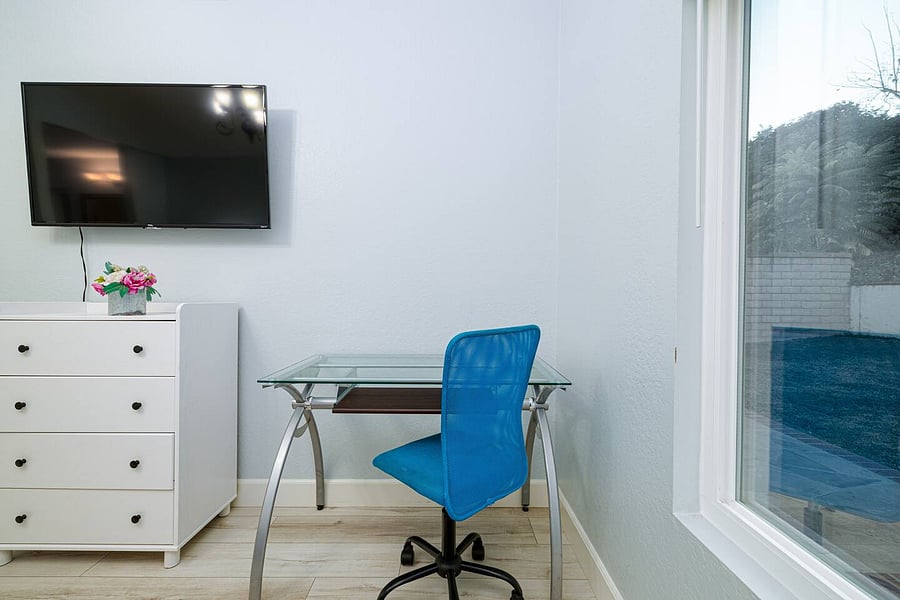 TV & computer desk/chair in master bedroom