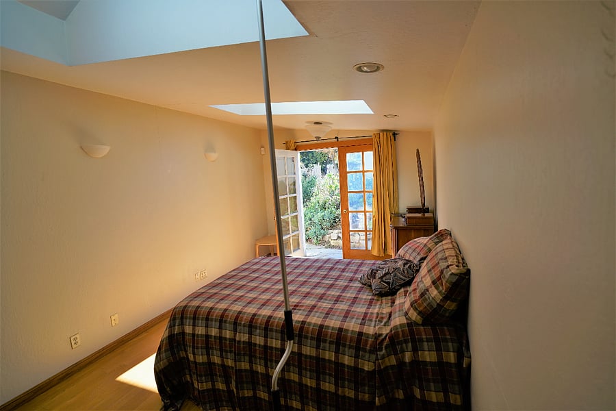 Door of private entrance  Skylight & ceiling recessed lighting  small refrigerator