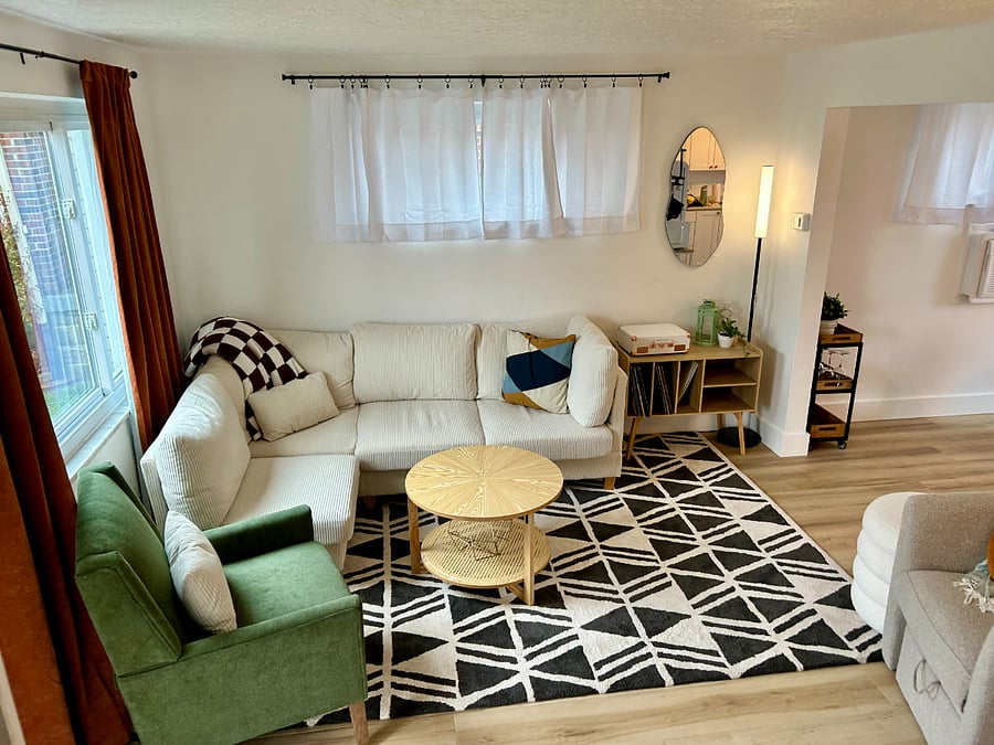 Living room. Record player and records included with stay.