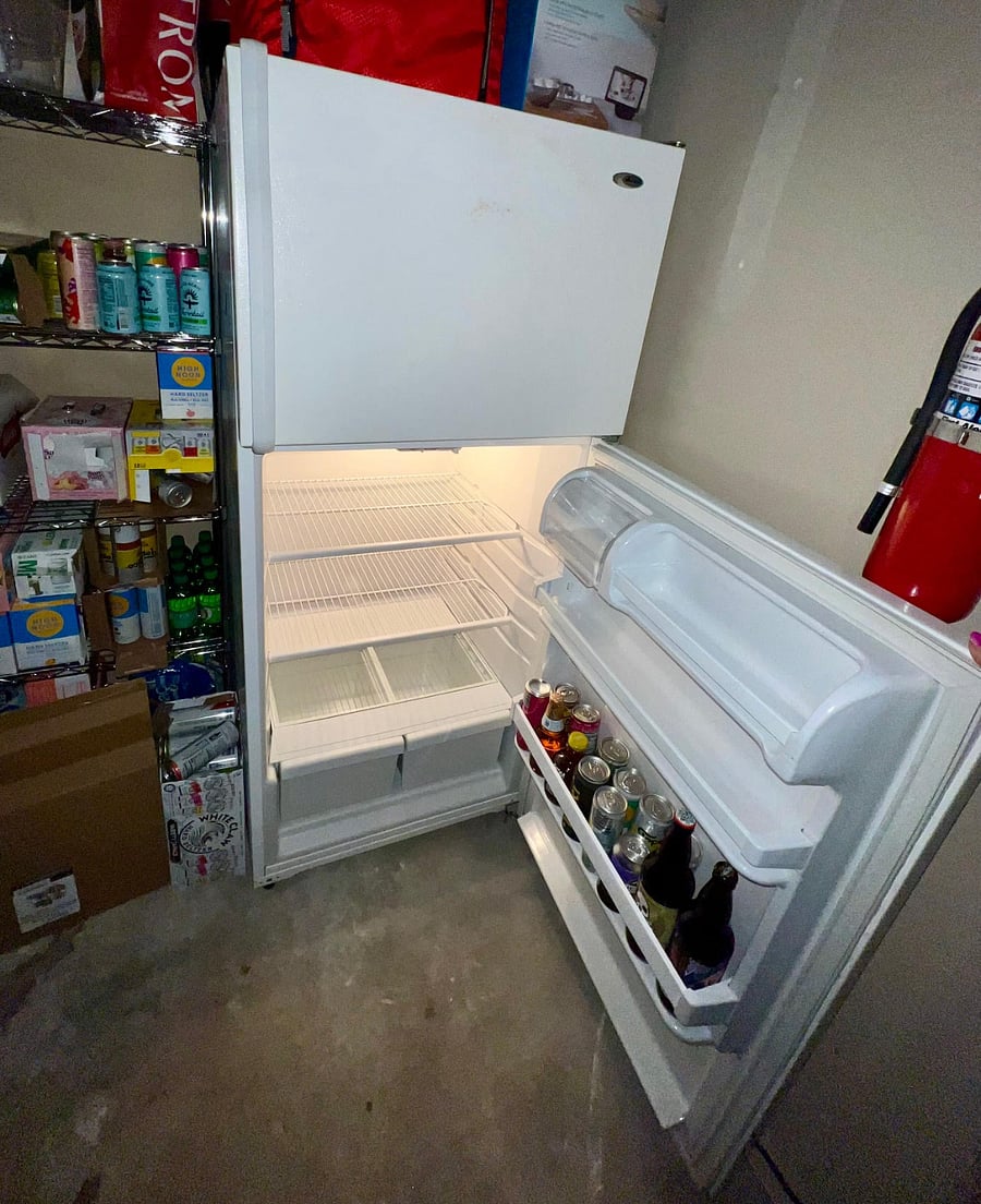 Full size fridge available for tenant use close to bedroom