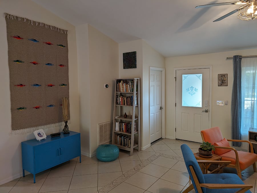 Entry door with books and CD player