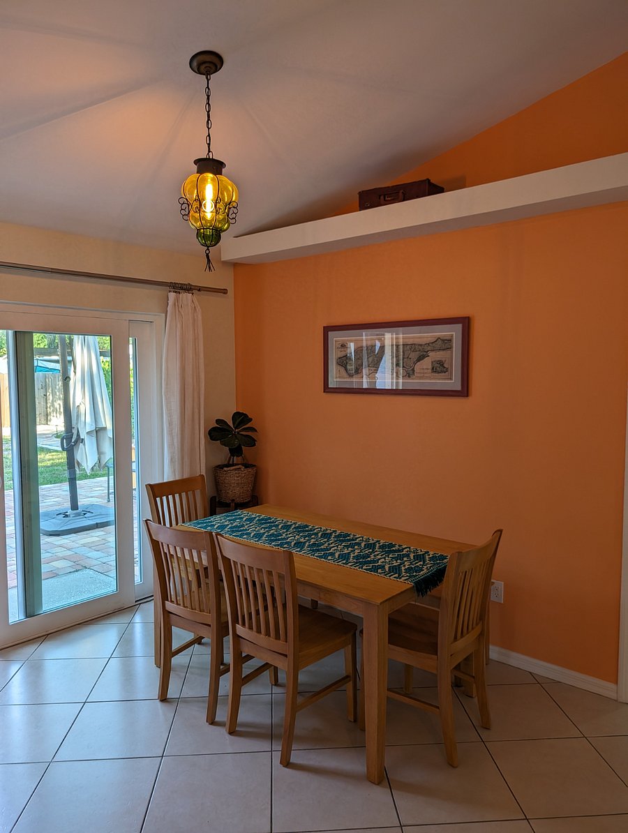 dining table, 4 chairs and a bench