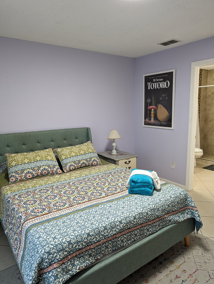 main bedroom with bathroom and walk-in closet