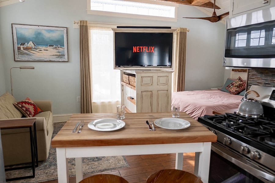 TV/Fireplace swivels, enjoy with dinner. Butcher block is on wheels
