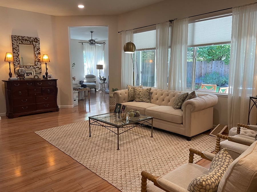 Living Room with Family Room (with gas fireplace) adjacent