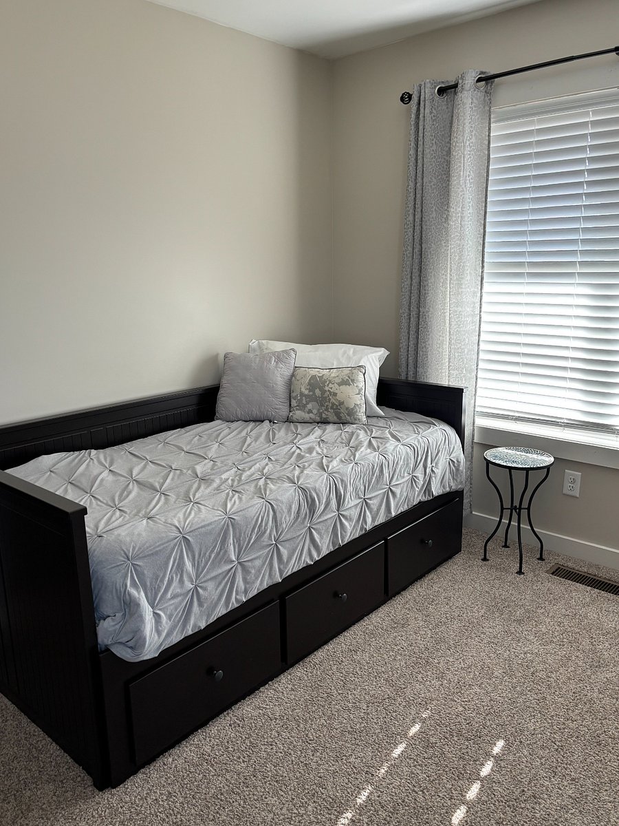 Twin bed with trundle located in Office