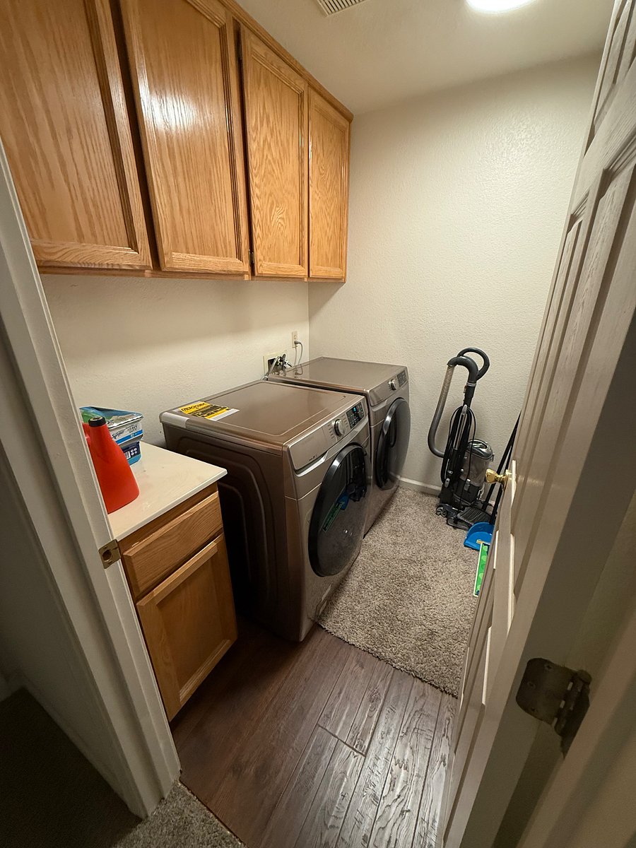 washer/dryer next to bedroom