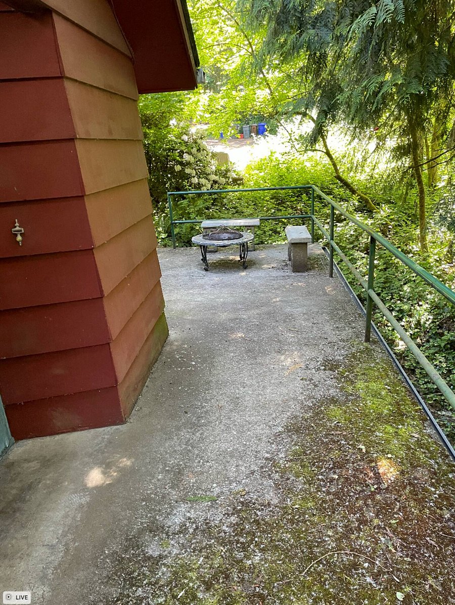 Part of the Large outdoor poured cement deck W/Fire Pit