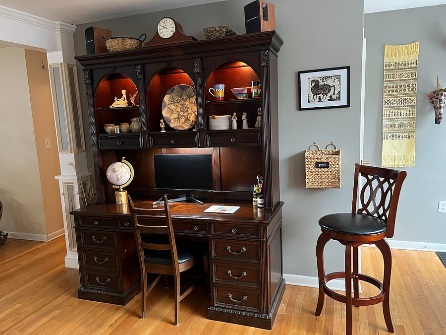 Desk with monitor and bluetooth speakers