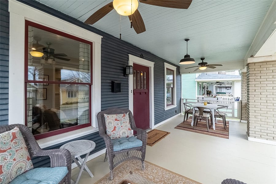 The gracious front porch is the perfect spot to have a cup of coffee in the morning or an iced tea after work and just watch the world go by.