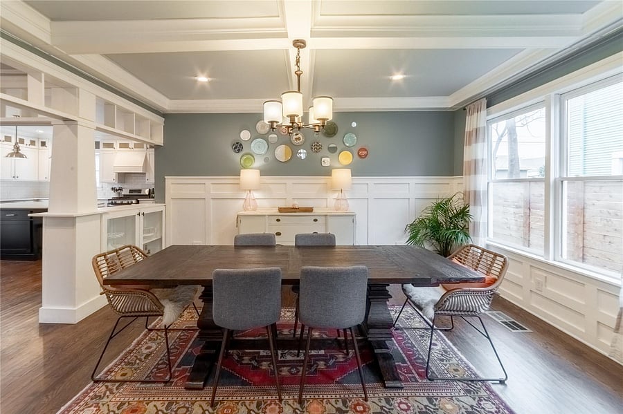 What do you love most about this dining room: The board and batten wainscoting? The coffered ceiling? Or the built-in colonnade case?