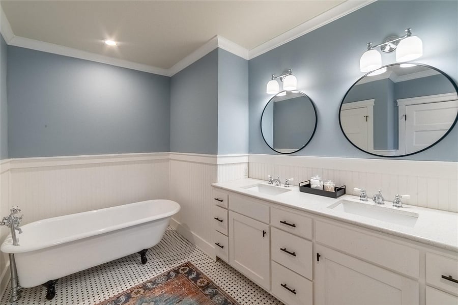 Professionally refinished original claw foot tub.