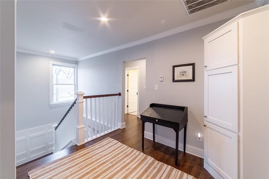 The upstairs landing to the 3 upstairs bedrooms and laundry room. Natural light lights up landing area.