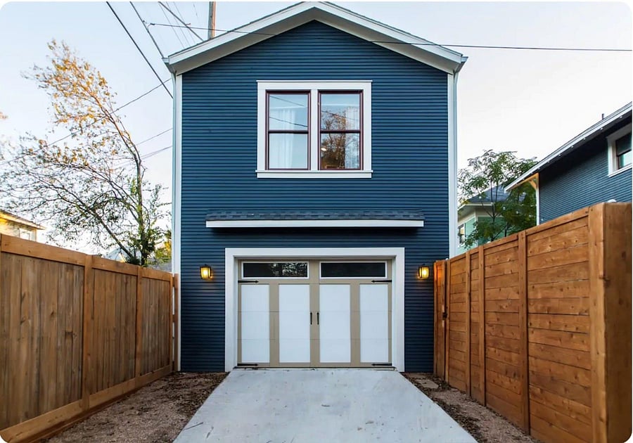 Large driveway to park your car and access backyard.