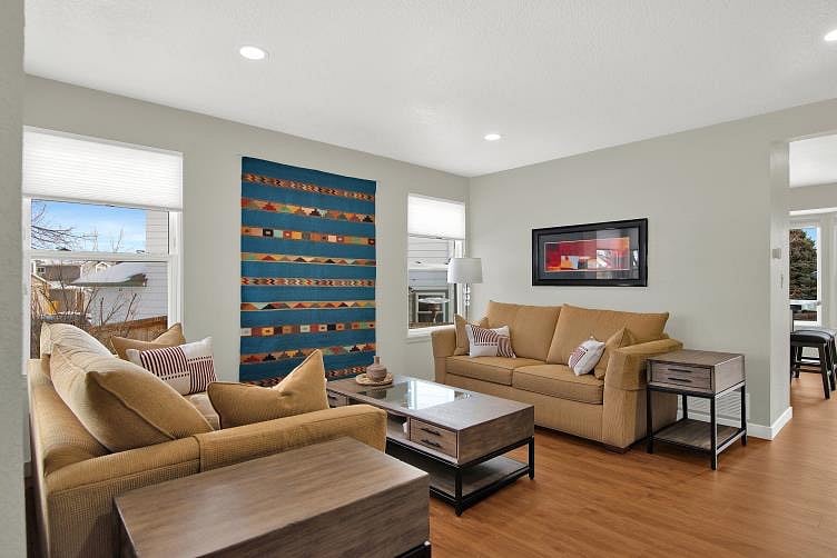 The living room is a cozy and comfortable space for rest, reading, or entertaining