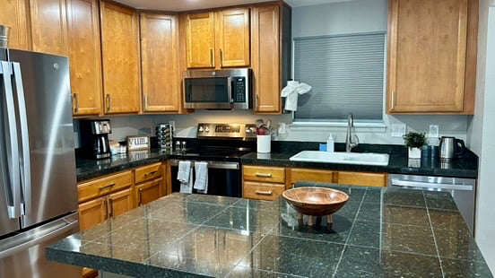 The Kitchen is always a favorite place in the house. It is set up with cooks and bakers in mind. If you are a reheater, no problem, you can do that here too!
