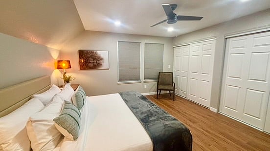 Blackout shades help control the light in the room. Two large hanging closets are available, with a just-in-case portable ladder if the need ever arises.