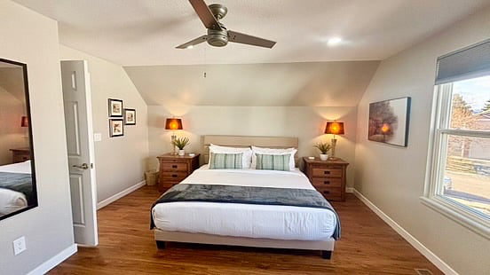 The Primary bedroom has a bend towards MidCentury design. It is spacious and cozy at the same time.
