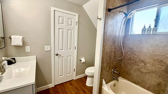 The private window next to the shower provides great daylight to the Primary bathroom.