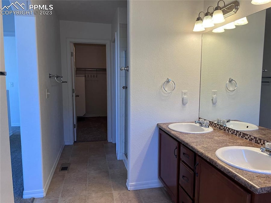 Features a 5-piece bath and walk-in closet