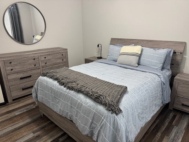 Bedroom 1 with Queen Bed separated from other rooms
