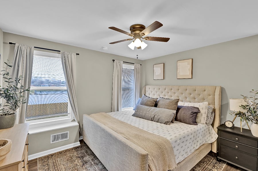 Primary upstairs bedroom with light blocking curtains