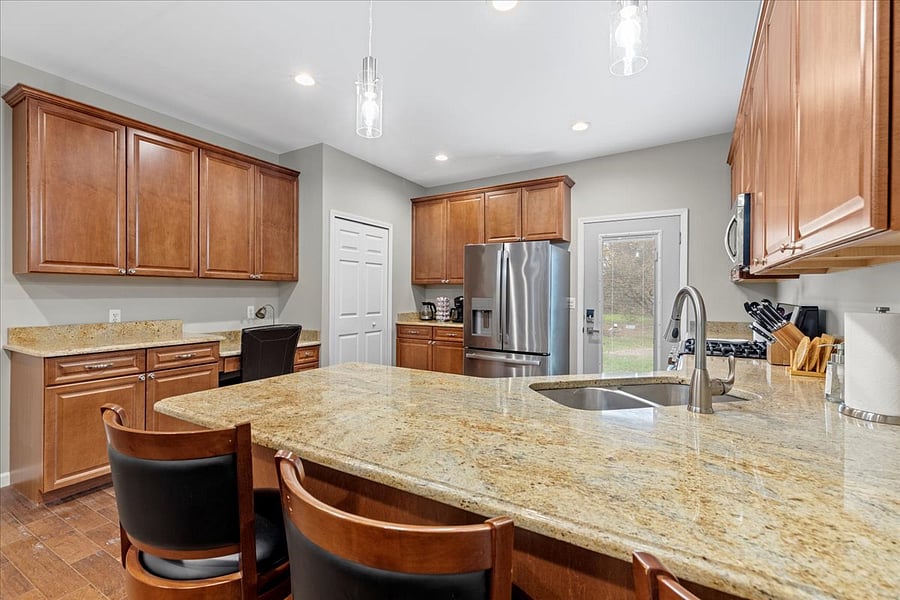 Bar stools and kitchen area