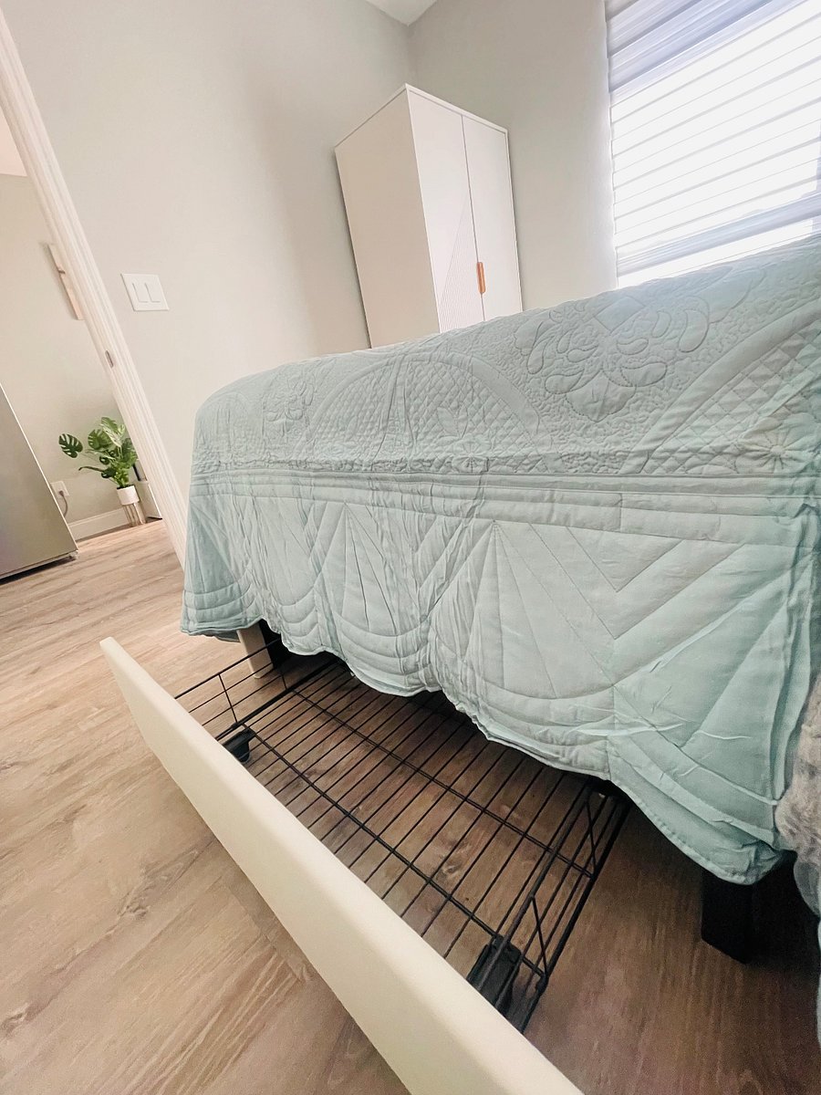Under the bed, two shoe racks for your convenience. Extra storage space. Wardrobe closet with 2 doors, clothes rail, and 3 drawers