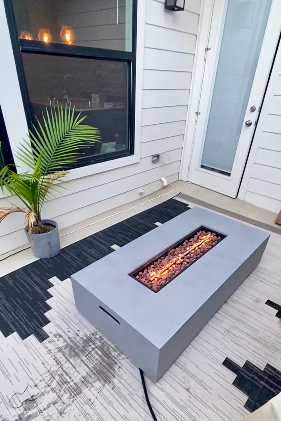 :: 1st Level ::
- Off Kitchen is Outdoor Enclosed Patio with/ Fire Pit, Bistro Table, and small area of turf.