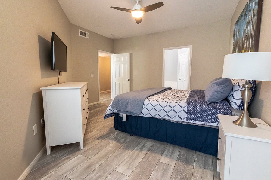 Master Bedroom has Large Walk In Closet, TV and Ceiling Fan