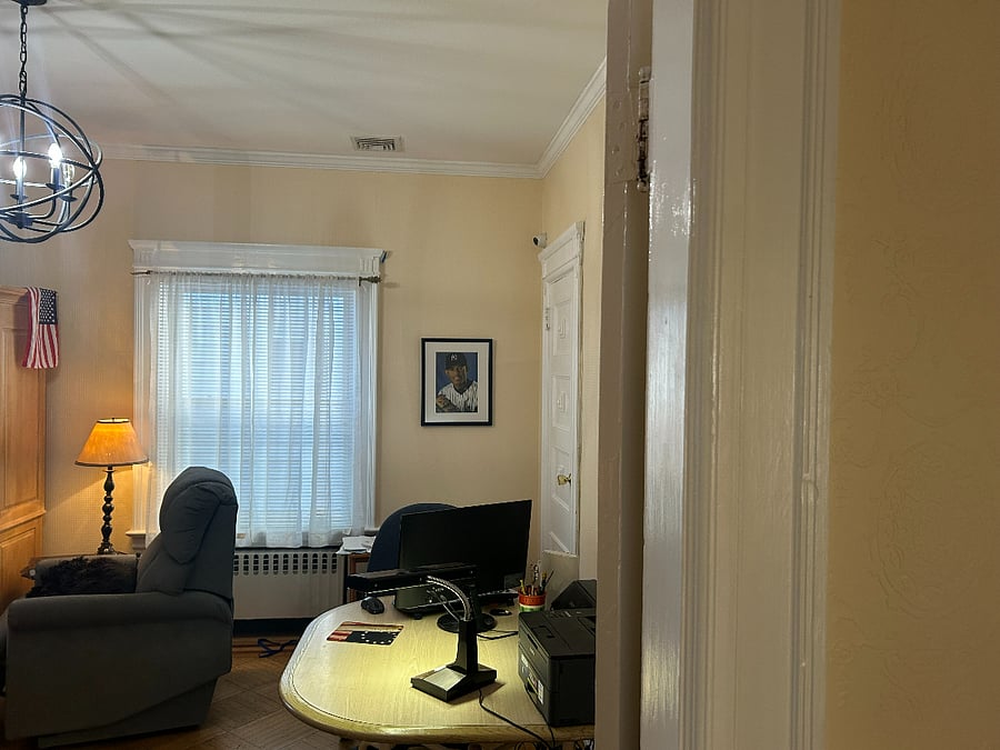 2nd floor office/tv room adjacent to bedroom.
View upon entry. Florescent desk lamp on table.
Driveway visible from this window.
Note work table and electric recliner that raises occupant to standing position if needed. The back and leg rest can be moved independently. (Lazy Boy Brand) by attached remote control. The exact same lazy boy brand recliner is not visible in this photo but is present against the opposite wall of this recliner.
Fast internet when tested, Verizon.
