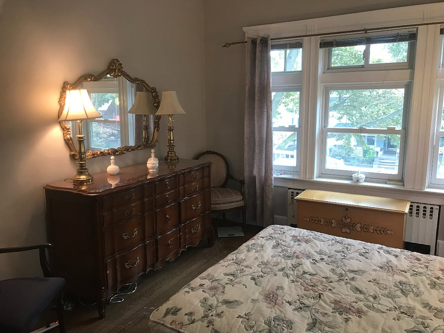 1st guest bed room view on entry.
Black out aluminum blinds are raised.
The "Vivienne".
Hope chest in front of window is removed and replaced with a small low coffee table.
